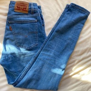 721 vintage high rise skinny jeans from Levi’s